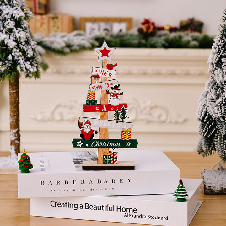 Houten kerstdecoratie voor op tafel met sneeuwpop en kerstman