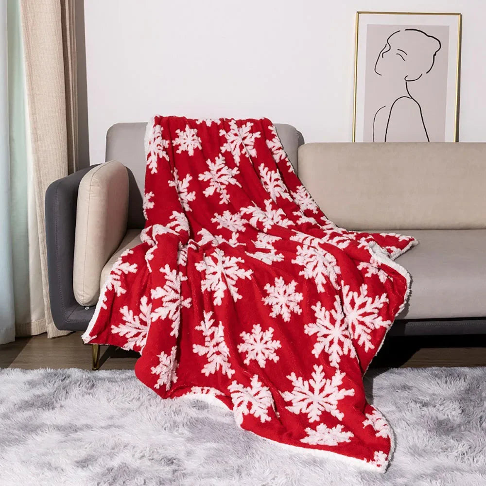Wollen kerstplaid met sneeuwvlokken voor bank en bed