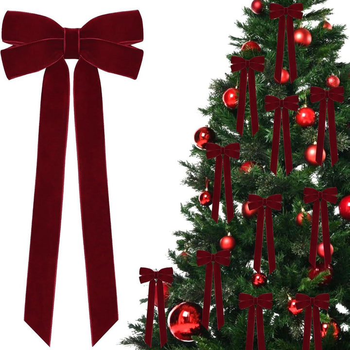 Rode fluwelen strik in de kerstboom