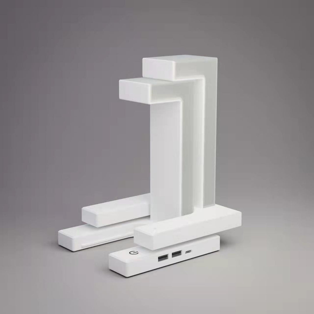 Witte zwevende lamp met telefoon op voet