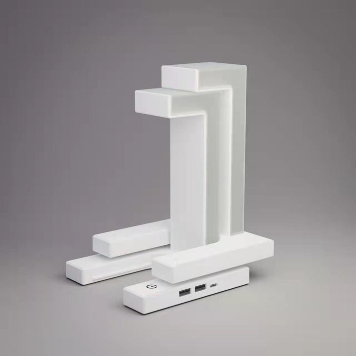 Witte zwevende lamp met telefoon op voet