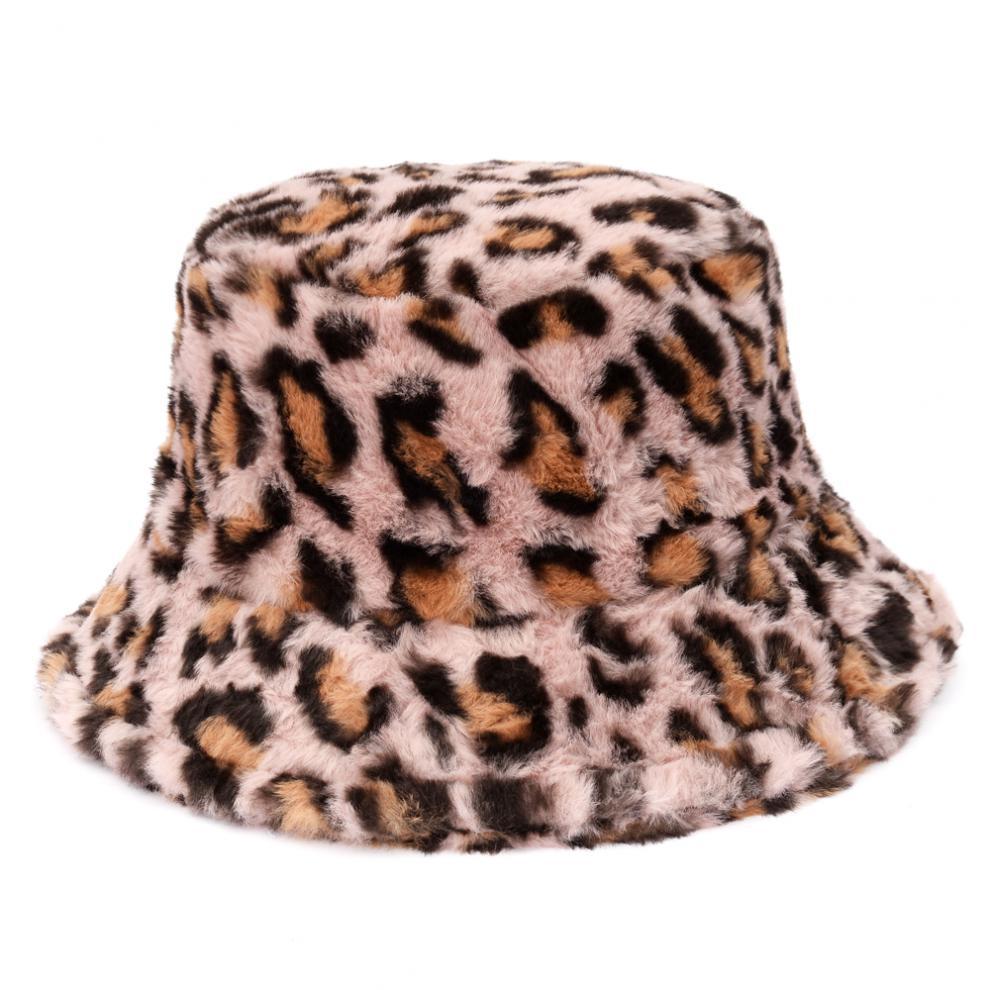 Pluizige bucket hat met koeienprint