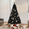 Volle zwarte kunstkerstboom