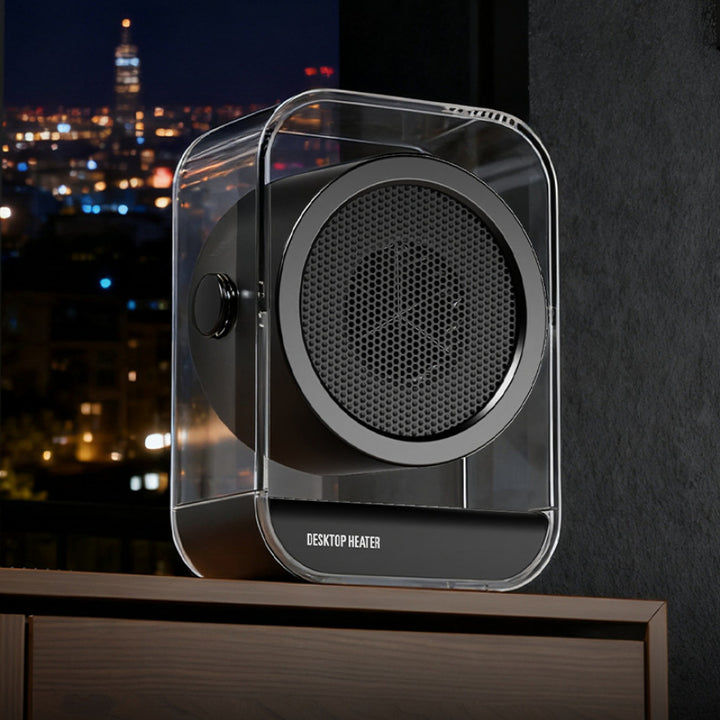 Doorzichtige mini ventilatorkachel op een bureau