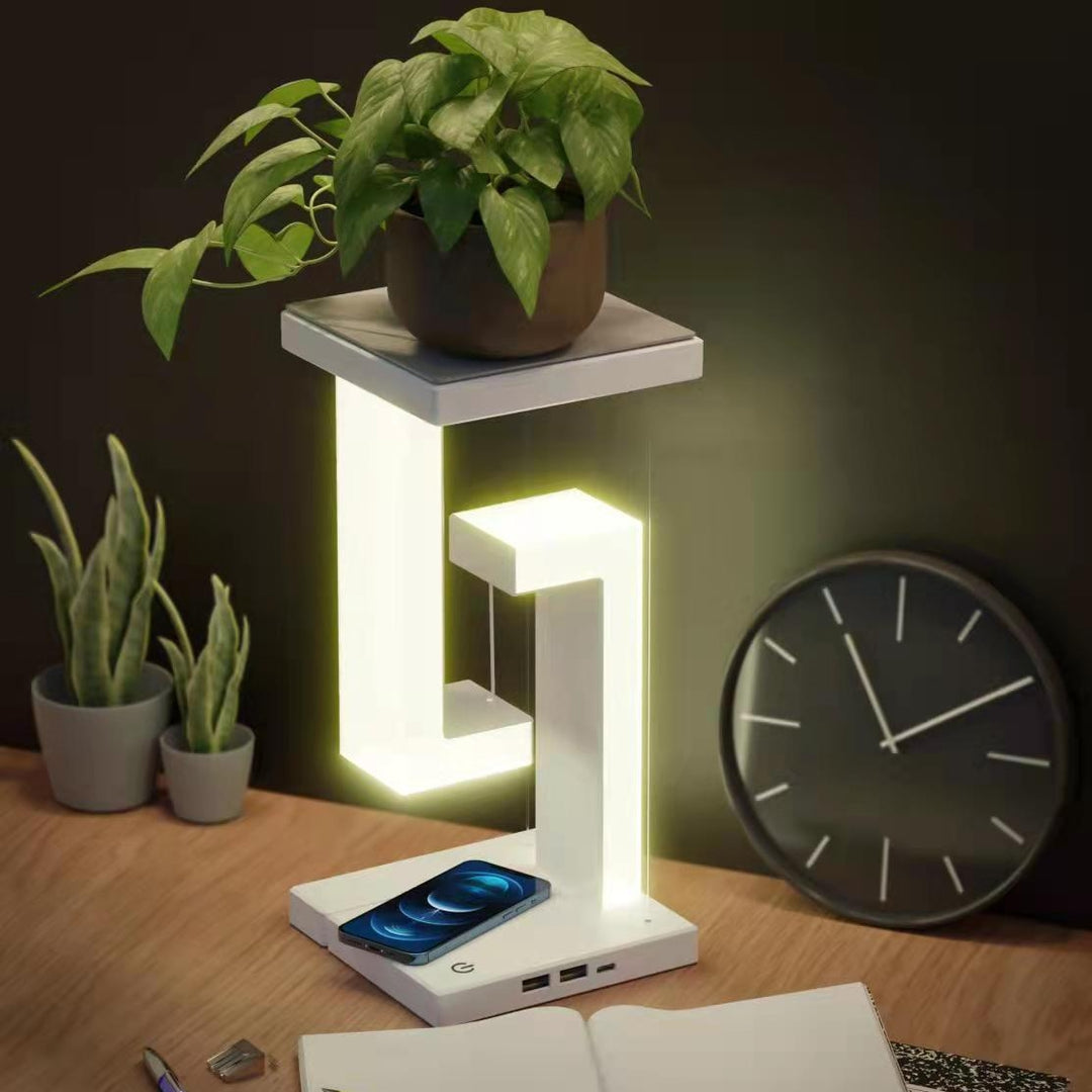 Witte zwevende lamp met telefoon op voet