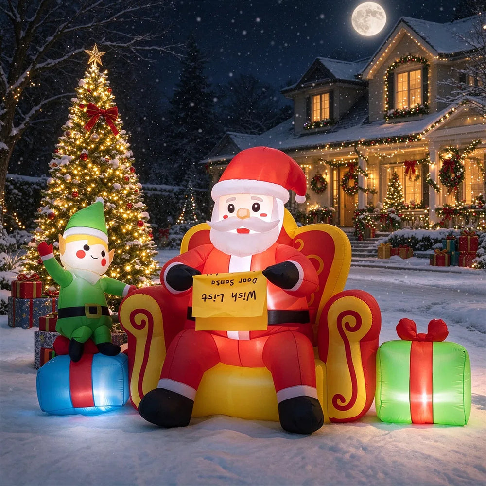 Opblaasbare kerstman op bank met elf