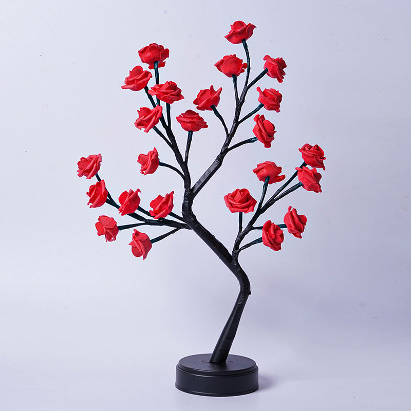 Rozenboom lamp met oplichtende roze rozen