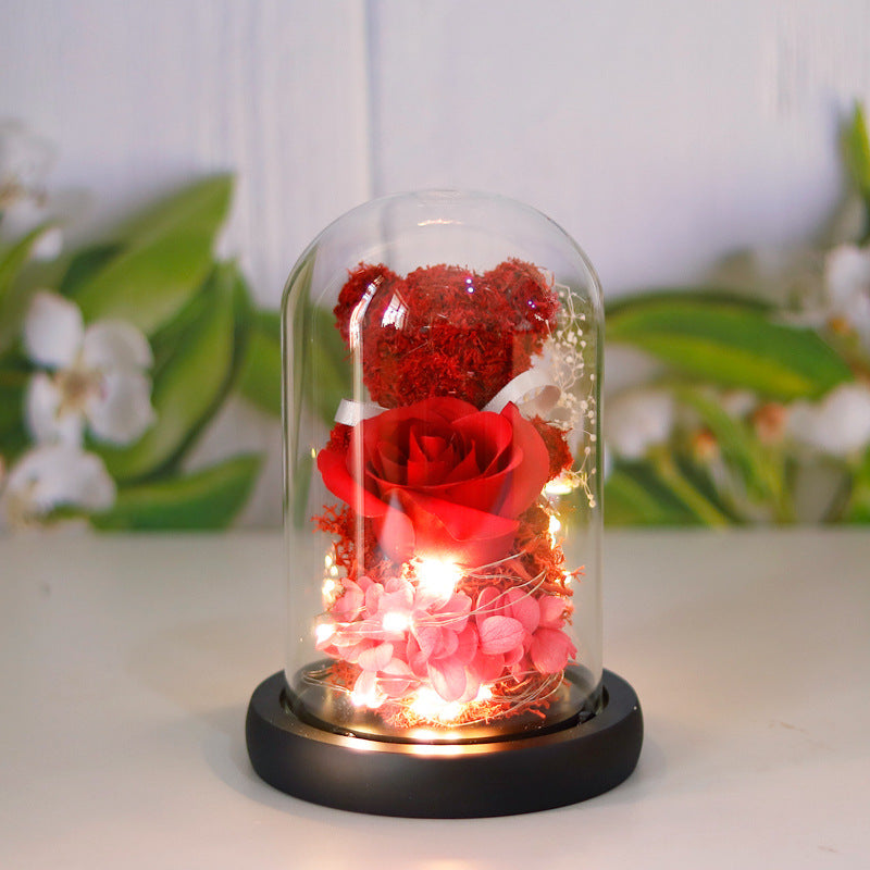 Eeuwige roos met teddybeer in glazen stolp en led-licht