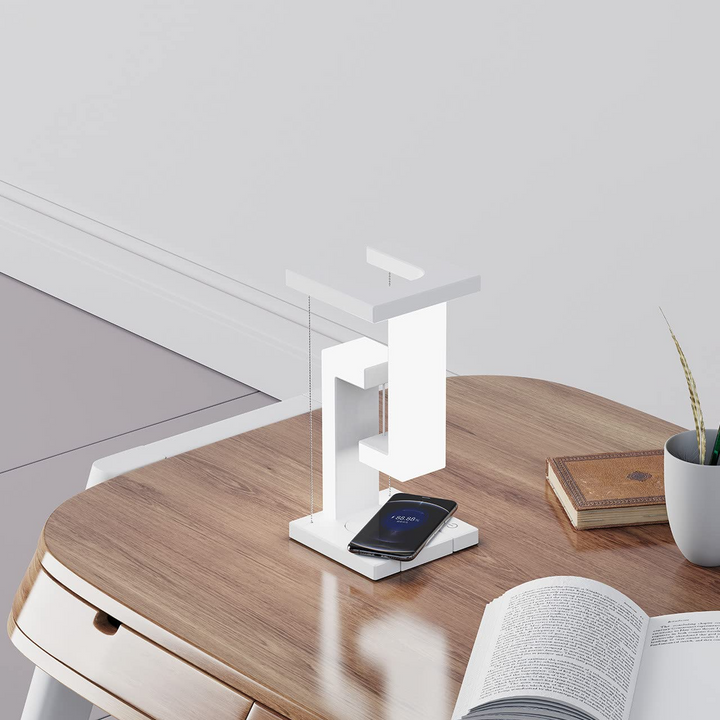 Witte zwevende lamp met telefoon op voet
