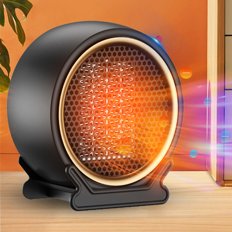 Compacte ronde ventilatorkachel op een bureau