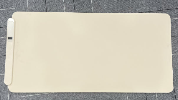 Oprolbare warmhoudmat van grafeen op tafel