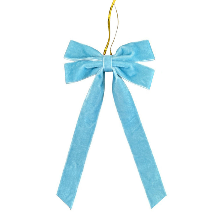 Rode fluwelen strik in de kerstboom