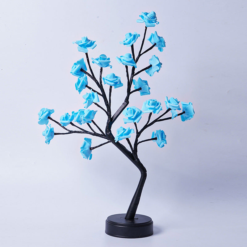 Rozenboom lamp met oplichtende roze rozen