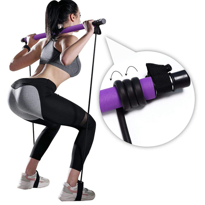 Pilates bar met weerstandsbanden en voetlussen