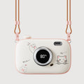 Roze handwarmer in cameravorm aan koord