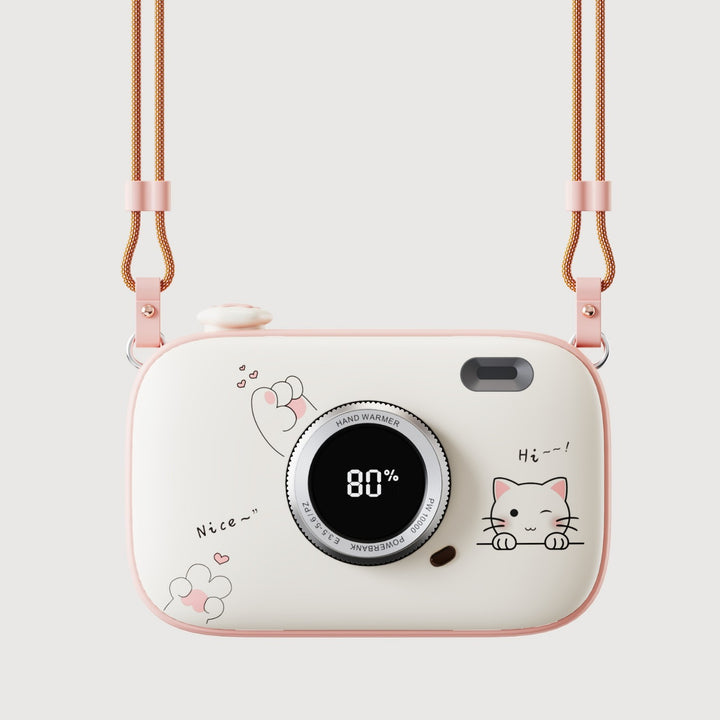 Roze handwarmer in cameravorm aan koord