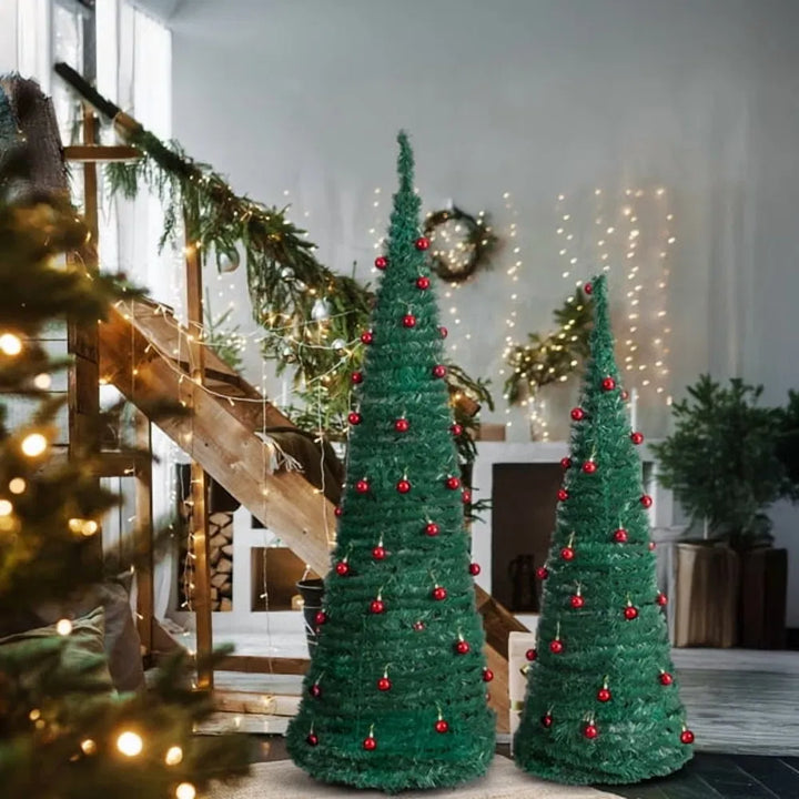Twee pop-up kerstbomen met rode ballen