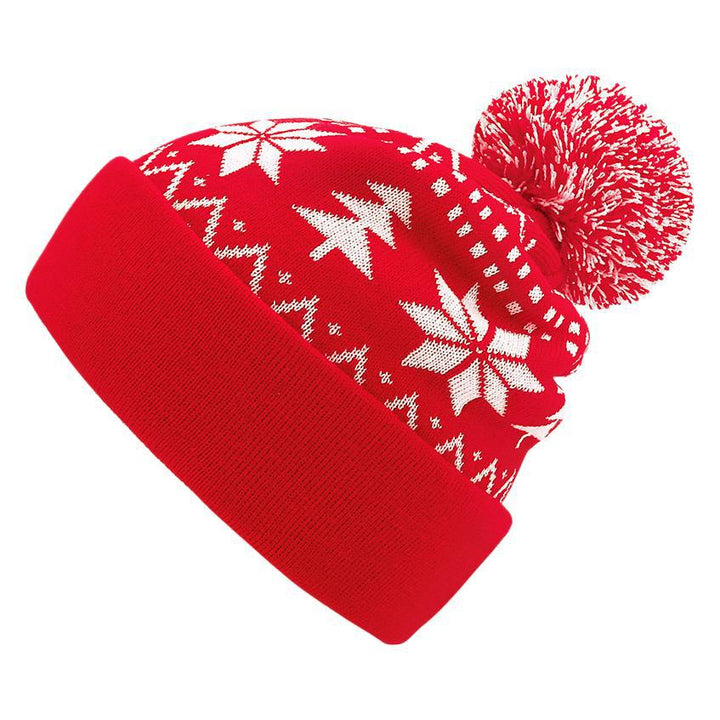 Gebreide kerstmuts met pompon en sneeuwvlokken