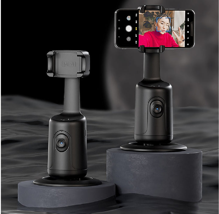 Witte telefoonhouder met gezichtsherkenning op tafel