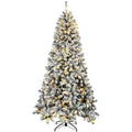 Besneeuwde Northern pine kerstboom met lichtjes