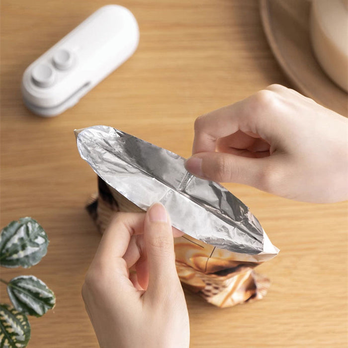 Hollevo™ Oplaadbare mini-sealer voor zakjes met ingebouwd mesje