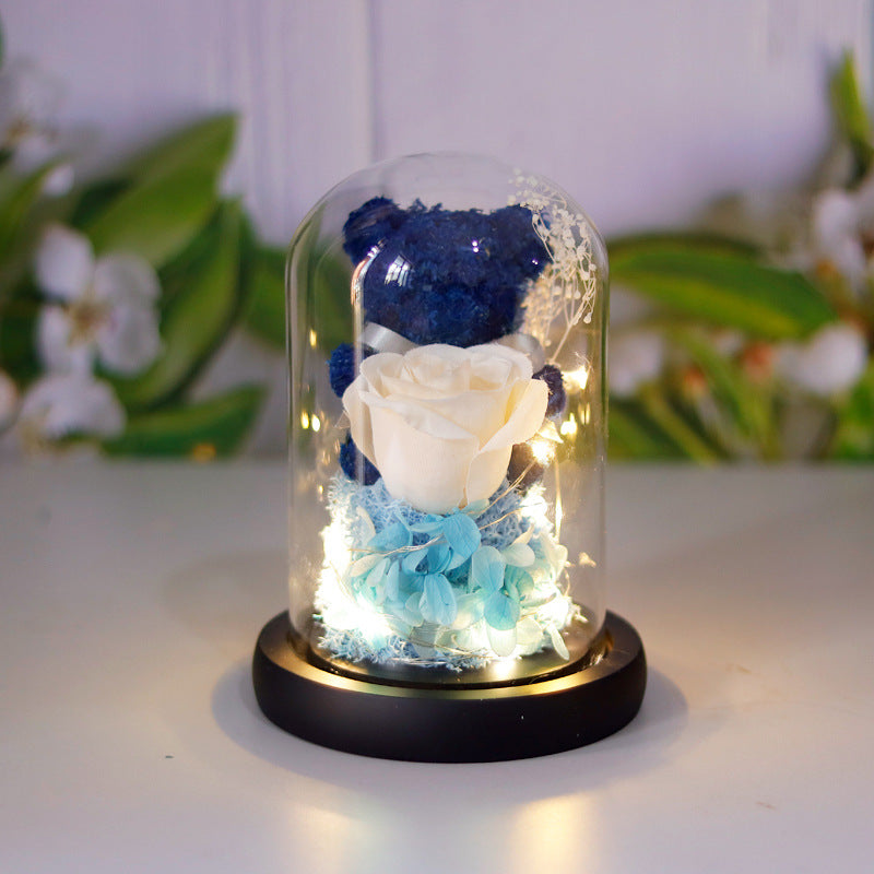 Eeuwige roos met teddybeer in glazen stolp en led-licht