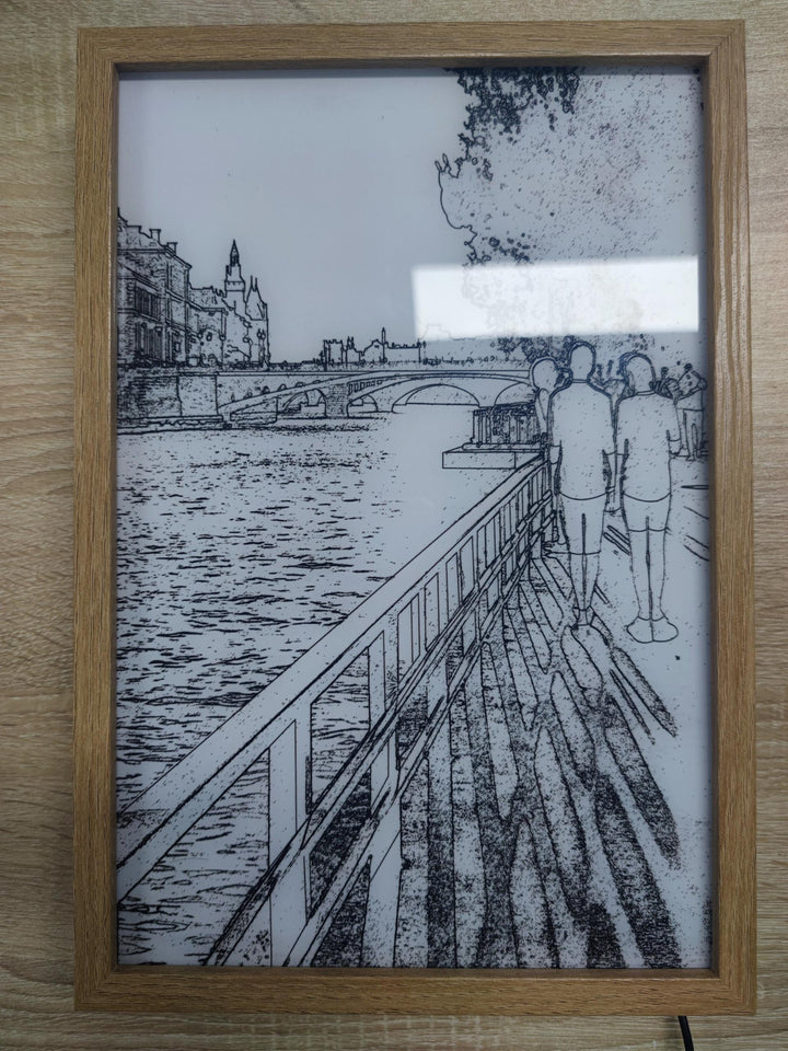 Verlicht schilderij met zonlicht door een raam