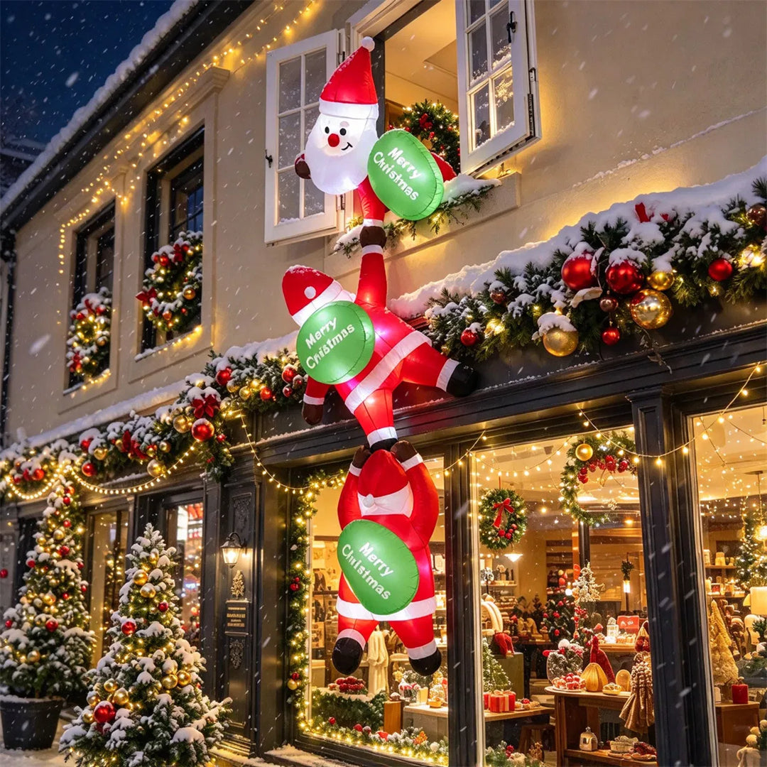 Opblaasbare decoratie met drie klimmende kerstmannen