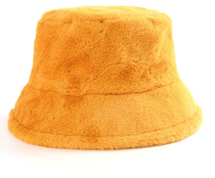 Pluizige bucket hat met koeienprint