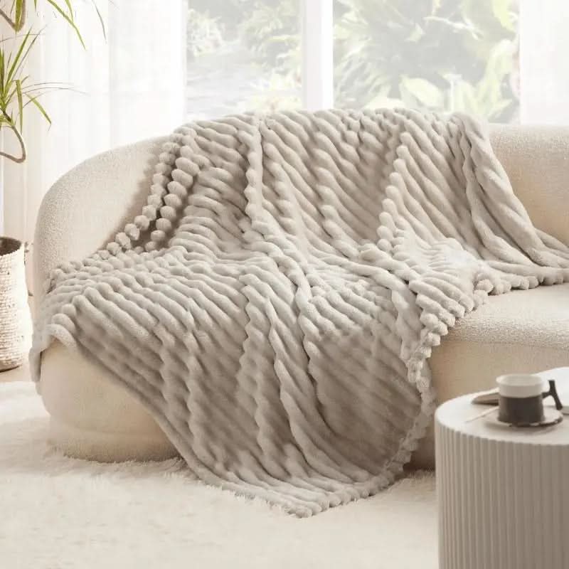 Zachte plaid met structuur voor bank en bed