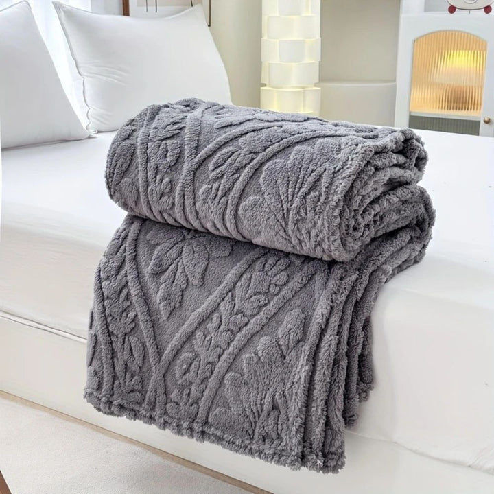 Hollevo™ Jacquard fleece plaid met geometrisch geweven patroon