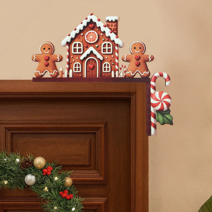 Houten kerstdecoratie met kerstman en sneeuwpop voor deur