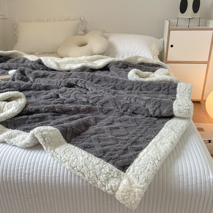 Kabelgebreide deken met teddy rand