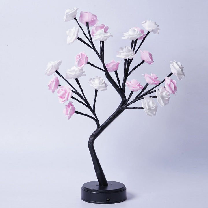 Rozenboom lamp met oplichtende roze rozen