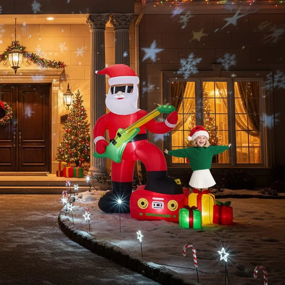 Opblaasbare kerstman met gitaar en zonnebril
