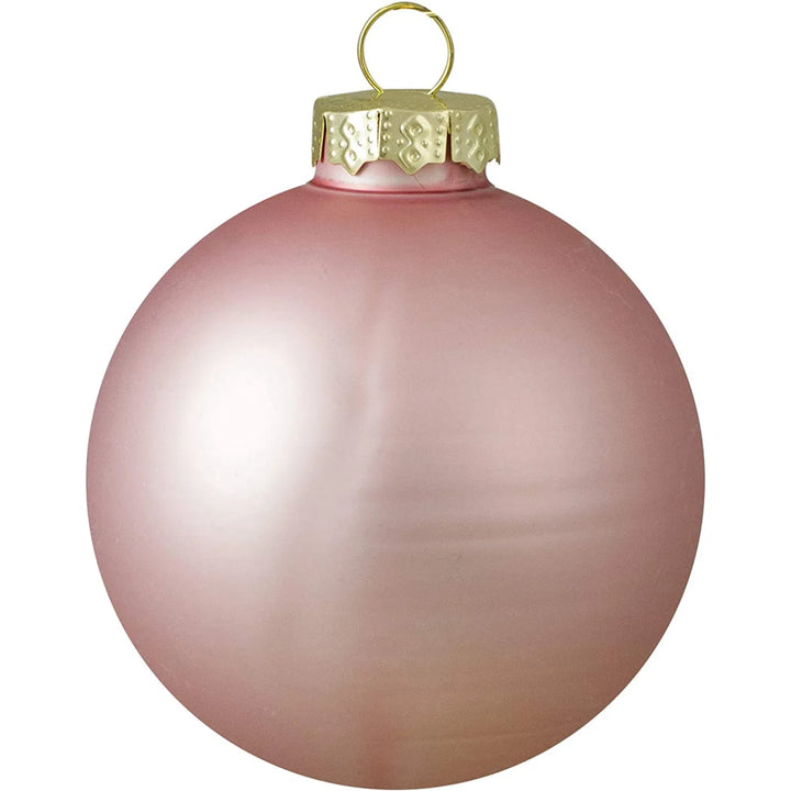 Negen roze glazen kerstballen, glanzend en mat