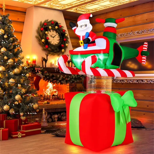 Opblaasbare kerstman in helikopter op cadeau