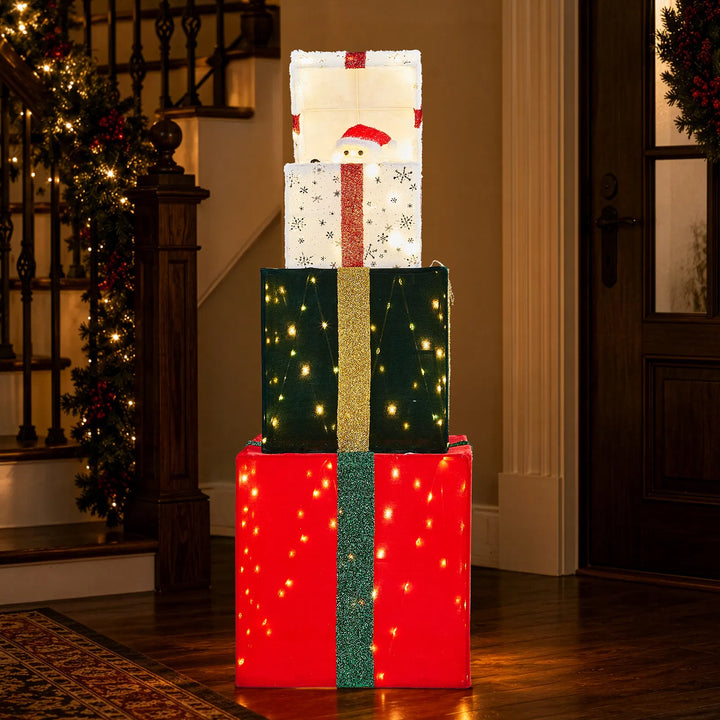 Bewegende toren van verlichte kerstcadeaus