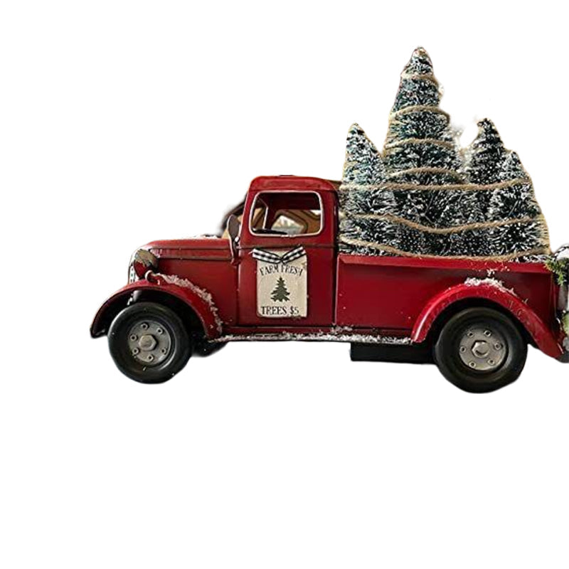 Rode boerderijtruck met kerstbomen en losse kerstboom