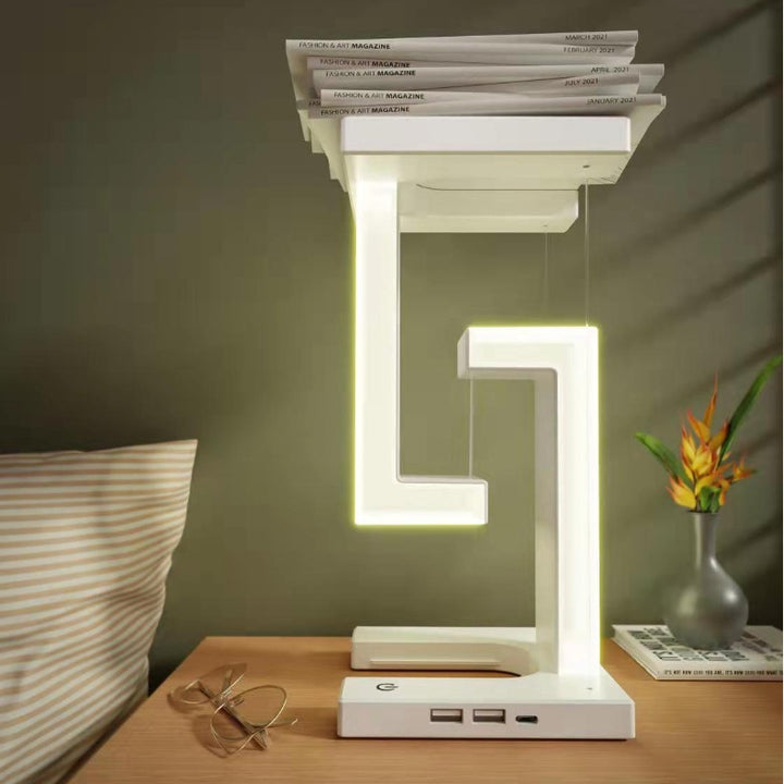 Witte zwevende lamp met telefoon op voet