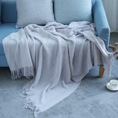 Gebreide plaid met streepstructuur en geknoopte franjes