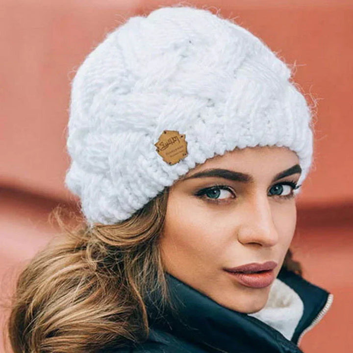 Zachte gebreide muts van wolmix voor elke winterdag
