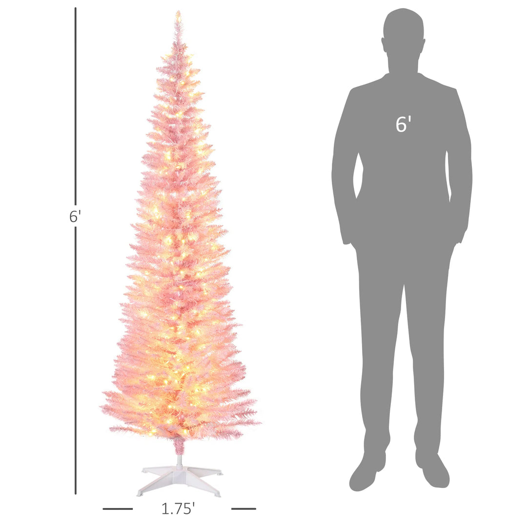 Roze smalle kerstboom vol warmwitte lampjes