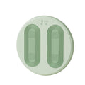 Ronde voetenwarmer met voeten erop