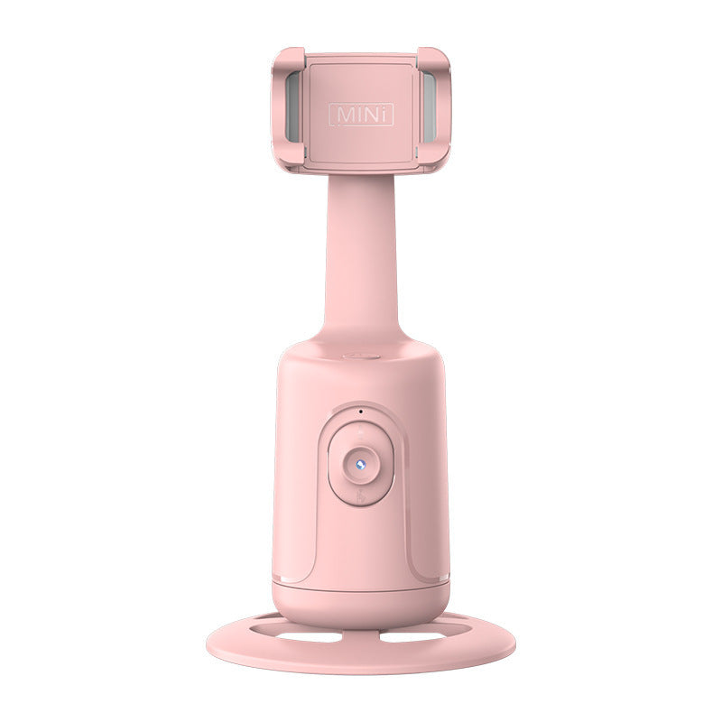 Witte telefoonhouder met gezichtsherkenning op tafel