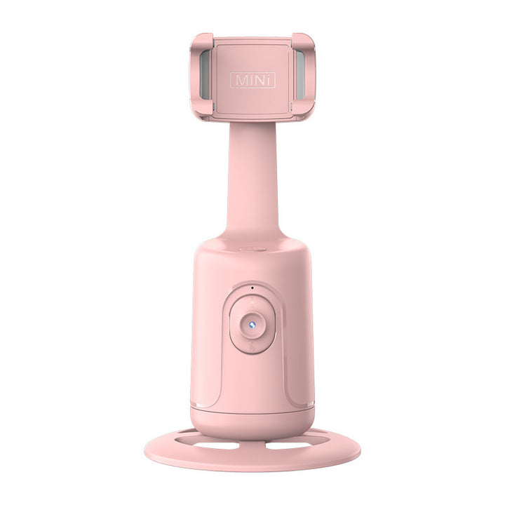 Witte telefoonhouder met gezichtsherkenning op tafel