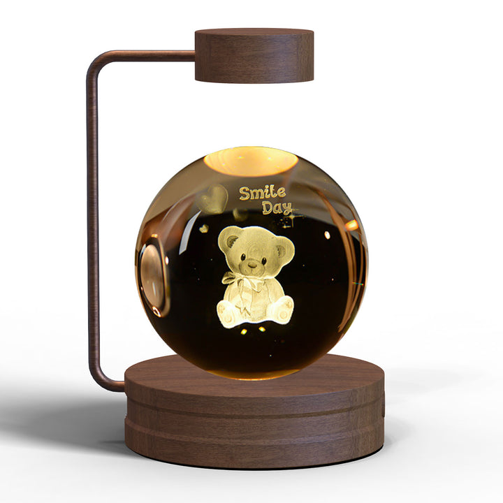 Kristallen bol met 3D gravure op houten voet