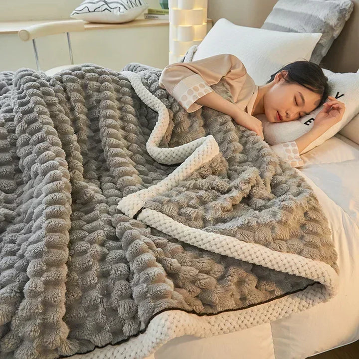 Dikke deken van coral fleece met zachte fluweelachtige textuur