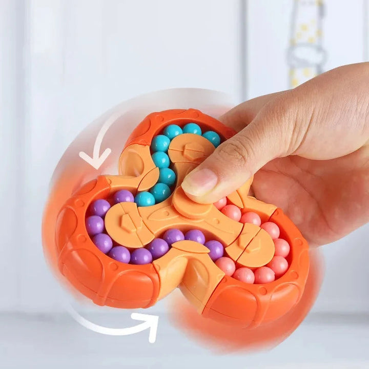 Draaiende fidget toy met zes kanten en kleurrijke balletjes