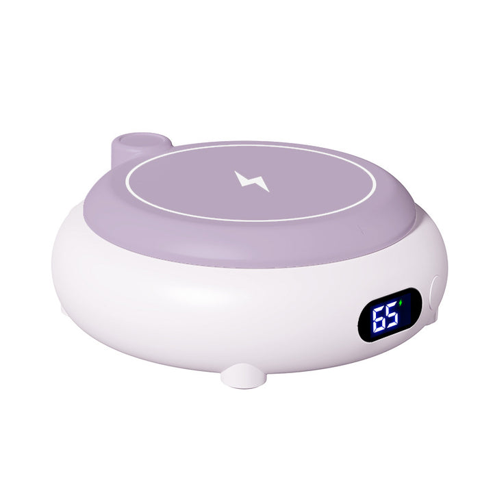 Roze mokwarmer met telefoon op laadvlak